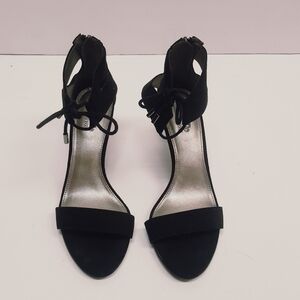 Coach‎ and four heels